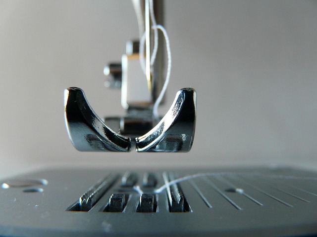 Close-up of handbag stitching showing neat, even lines and a subtle brand tag