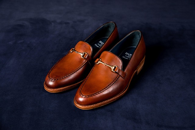 Close-up of YSL loafers showing leather grain and stitching