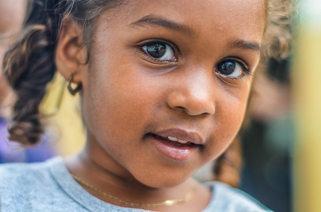 Close-up of a Zara Kids garment showing fabric texture and stitching quality, with a tag indicating material composition.