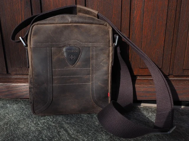 A brown leather Strellson messenger shoulder bag