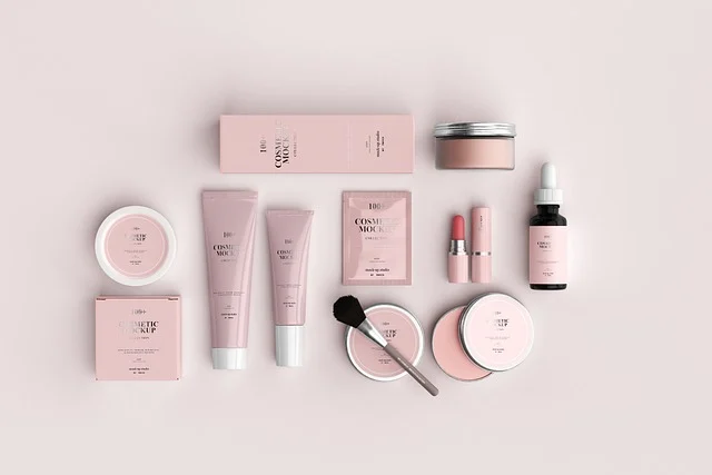 Various pink skincare and cosmetic packaging mockups laid out flat