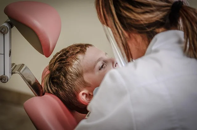 dermatologist examining a patient's skin (dermatologist near me)