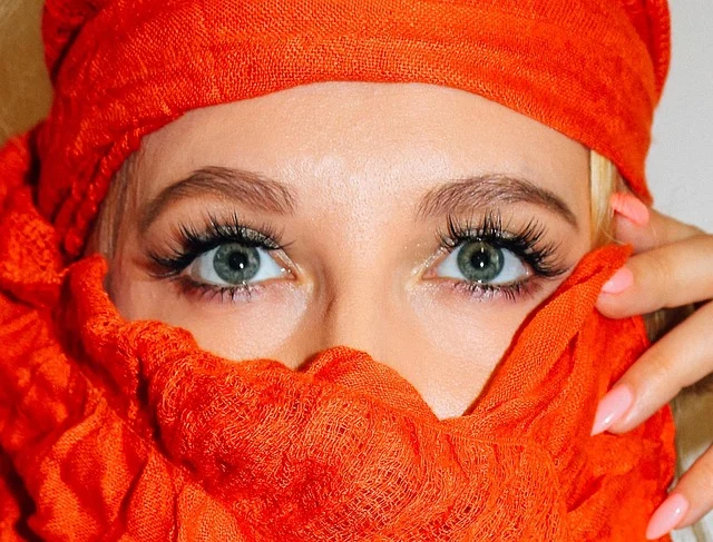Eyelash extensions cost and maintenance: A close-up of a woman's eyes with long eyelash extensions
