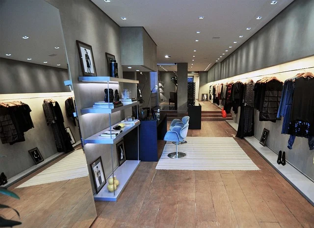 Interior of a modern clothing boutique with garments on racks