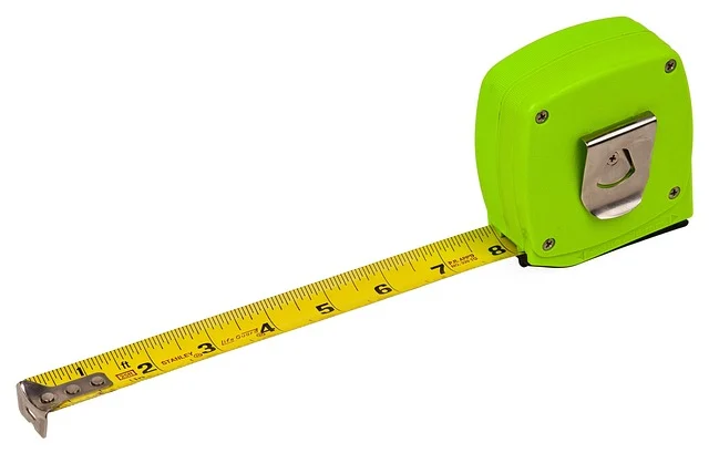 A green retractable metal tape measure