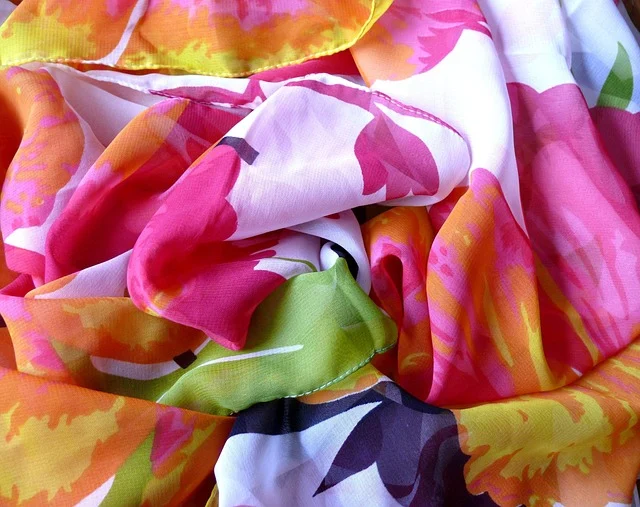 Colorful floral pattern silk scarf fabric folded