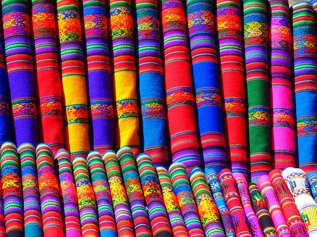 Colorful rolled traditional woven textiles and fabrics