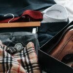 man choosing clothes from wardrobe