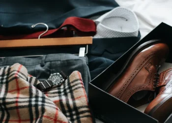 man choosing clothes from wardrobe