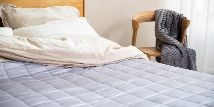 person sleeping comfortably on mattress
