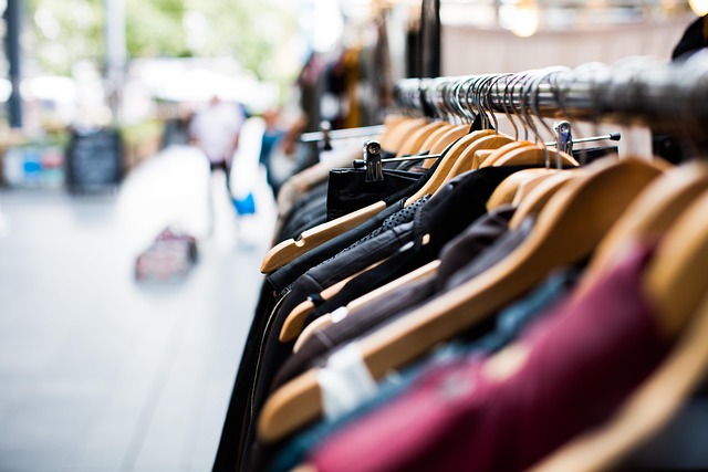 Retail store owner looking at a spreadsheet with loan payment calculations (SBA loans for retail business explained)