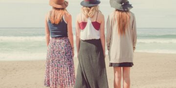 stylish women carrying discounted designer bags