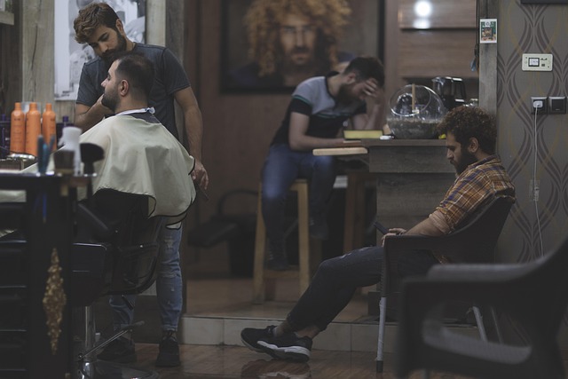 Stylist applying hair gloss treatment to client's hair (what is hair gloss)