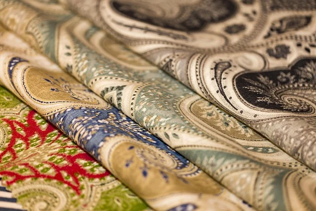 Blue ivy carter green suit: Paisley patterned fabric swatches in various colors