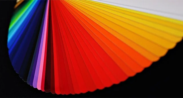 A fanned out colorful color swatch deck