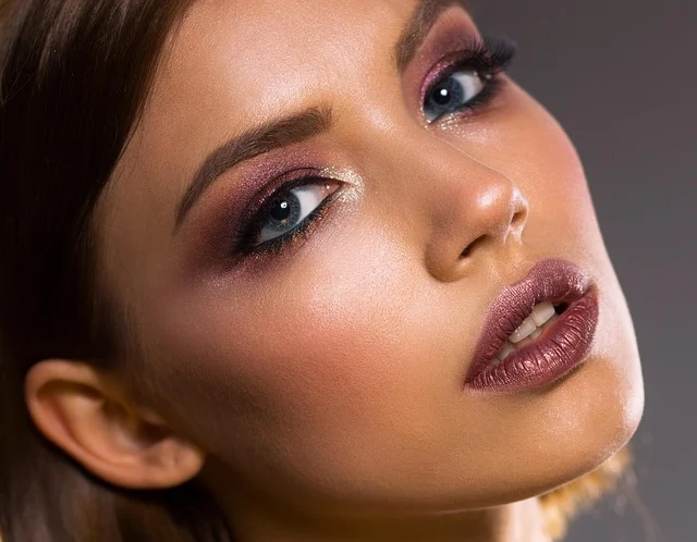 Close-up portrait of a woman with heavy glamour makeup