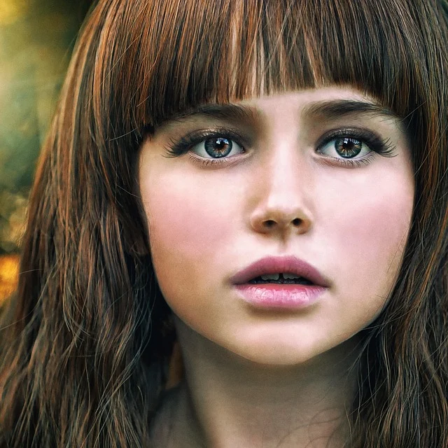 A close-up portrait of a young girl with clear skin