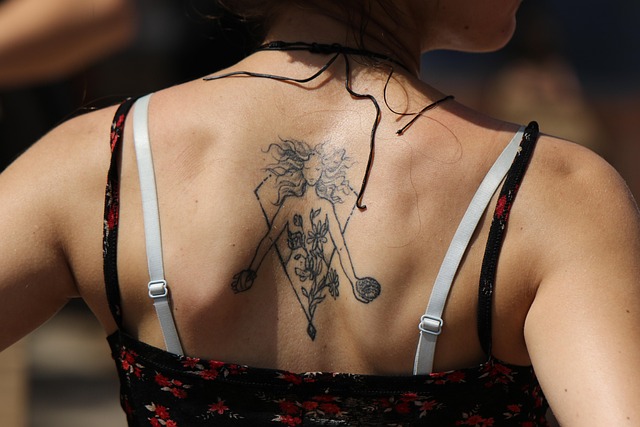 Woman experiencing bra fit issues with a band that rides up