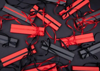 woman opening clothing subscription box