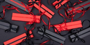 woman opening clothing subscription box