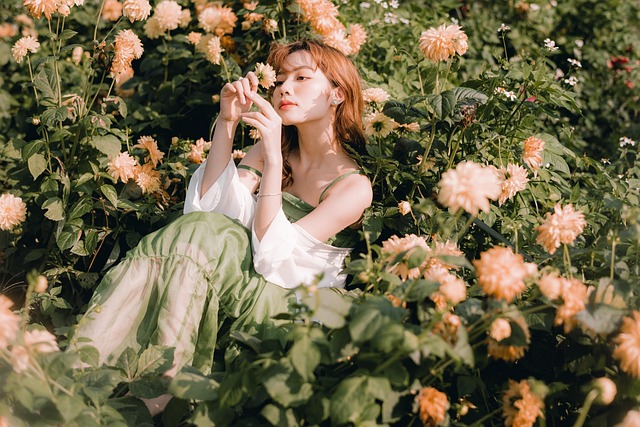 A woman twirling in a Zimmermann floral print dress with voluminous sleeves.