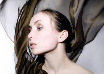 woman wearing a silk scarf top