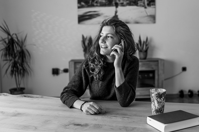 Woman checking phone in bed, illustrating pre-sleep screen time mistake